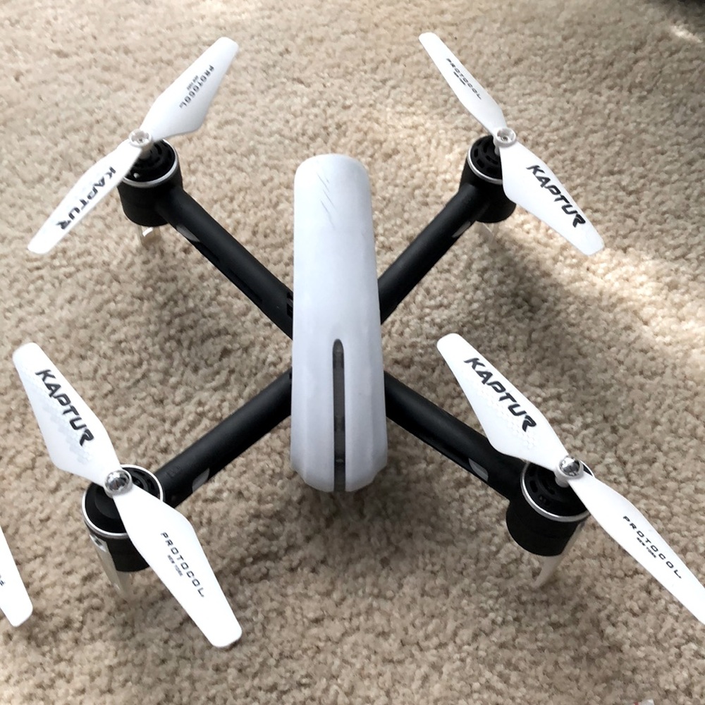 A medium sized drone white and black easy to use